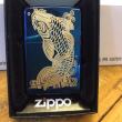 Zippo xanh khắc cá chép mạ vàng